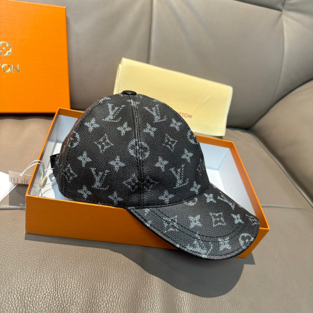 Monogram canvas cap, dark logo print with curved brim and stitched seam detail