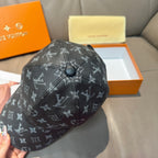 Monogram canvas cap, dark logo canvas with front button and stitched panels