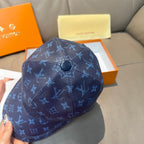 Louis Vuitton baseball cap in dark navy with blue monogram and black button