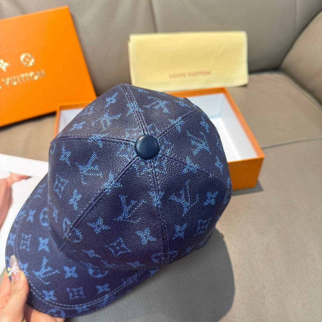 Louis Vuitton baseball cap in dark navy with blue monogram and black button