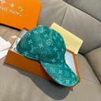 Louis Vuitton green monogram baseball cap, side view with curved brim