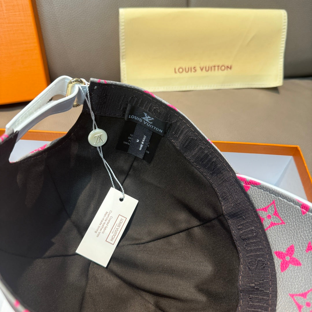 Louis Vuitton baseball cap, black brim with gray-pink monogram and hanging tags