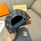 Monogram canvas cap, dark logo print with eyelets and drawstring tags