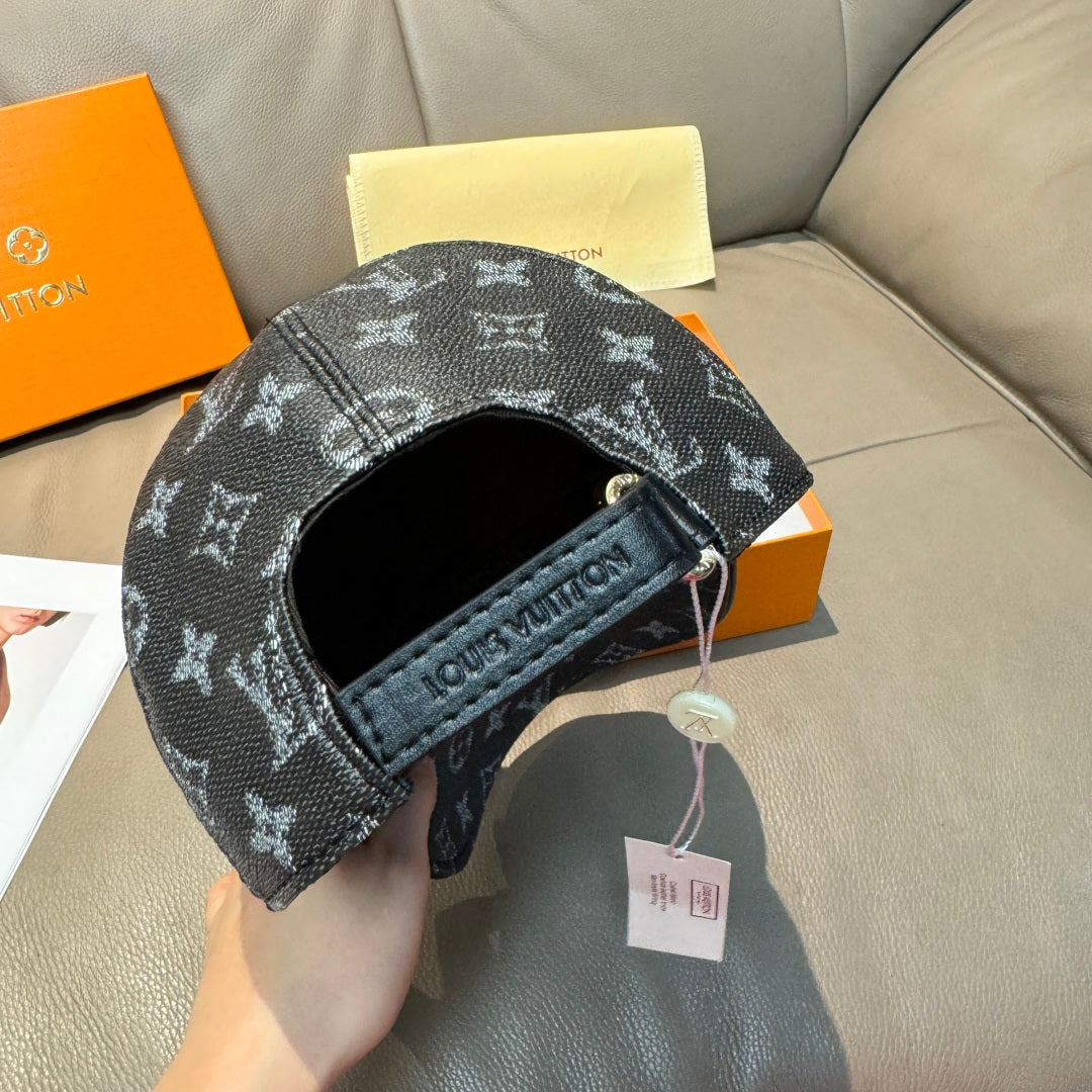 Monogram canvas cap, dark logo print with eyelets and drawstring tags