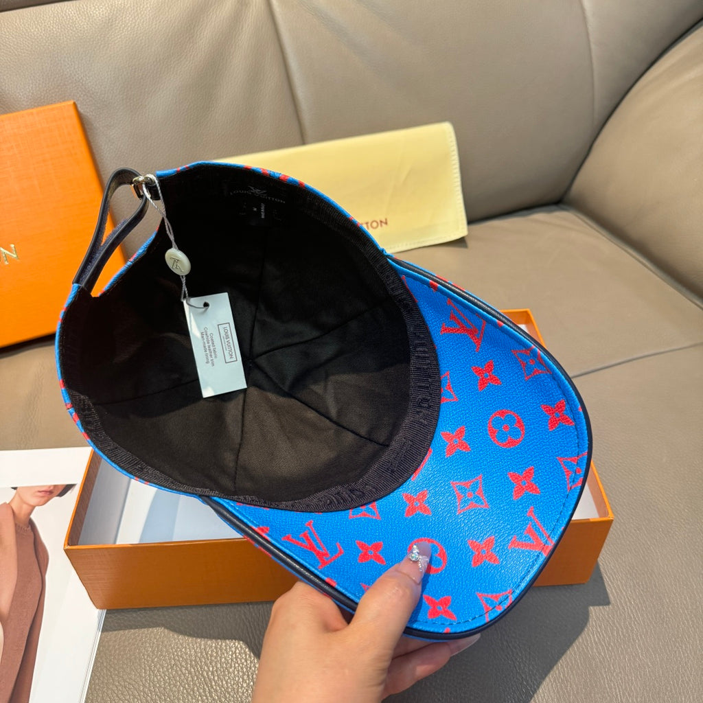 Louis Vuitton cap with interior view: black lining and bright blue red monogram exterior