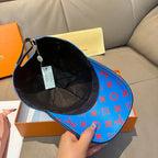 Louis Vuitton cap with interior view: black lining and bright blue red monogram exterior