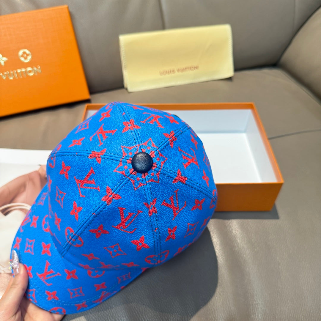 Louis Vuitton cap in bright blue with red monogram pattern, side front