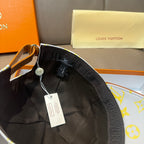 Louis Vuitton baseball cap with black interior, adjustable strap, and monogram brim