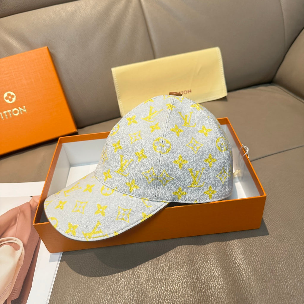 Louis Vuitton baseball cap, light blue with yellow monogram all-over print and curved brim