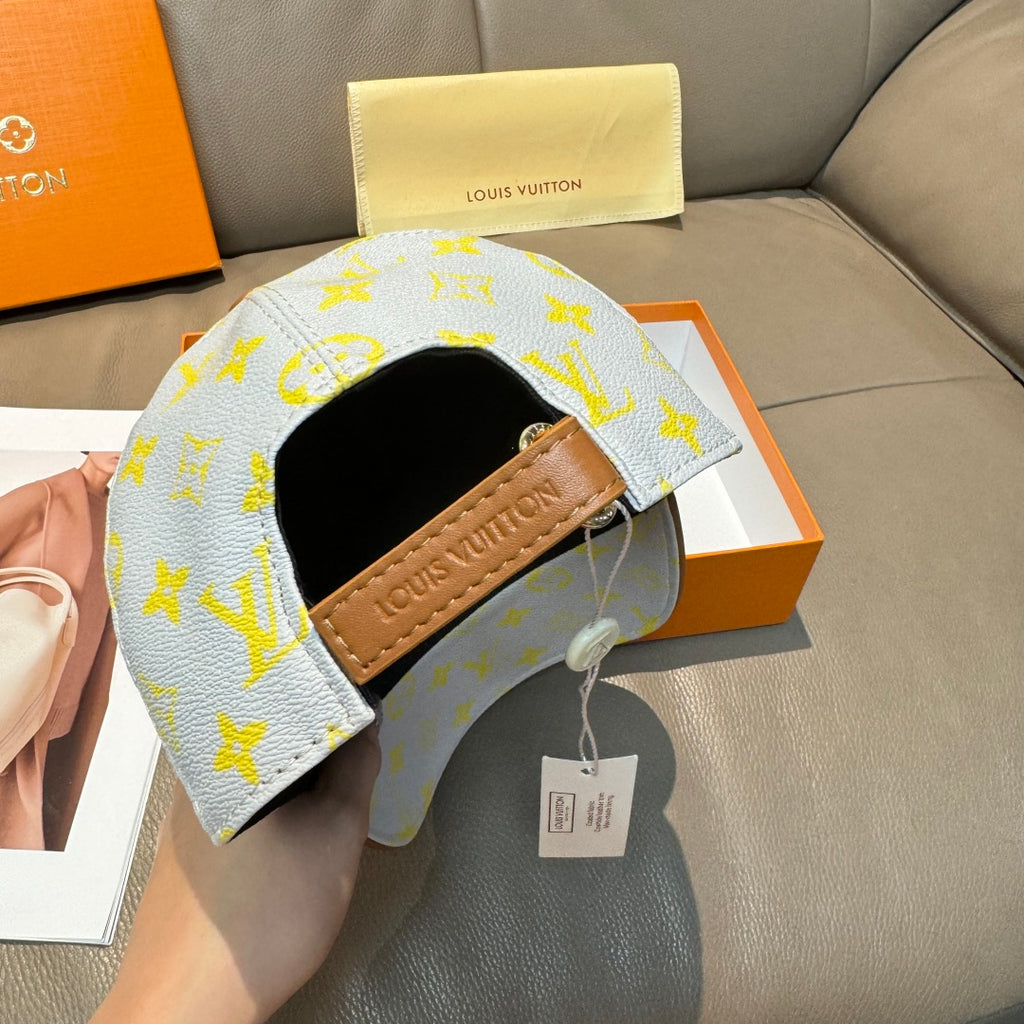 Louis Vuitton baseball cap with light blue monogram and tan leather inner trim