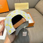 Louis Vuitton baseball cap with light blue monogram and tan leather inner trim
