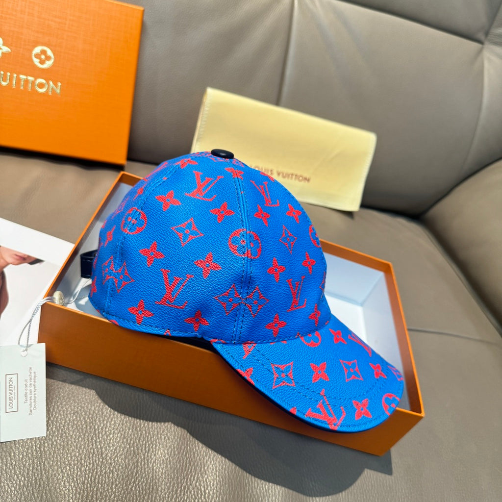 Louis Vuitton cap in bright blue with red monogram pattern, side profile