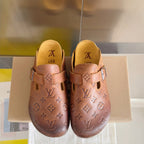 Louis Vuitton x Birkenstock brown sandals with embossed monogram and two buckled straps