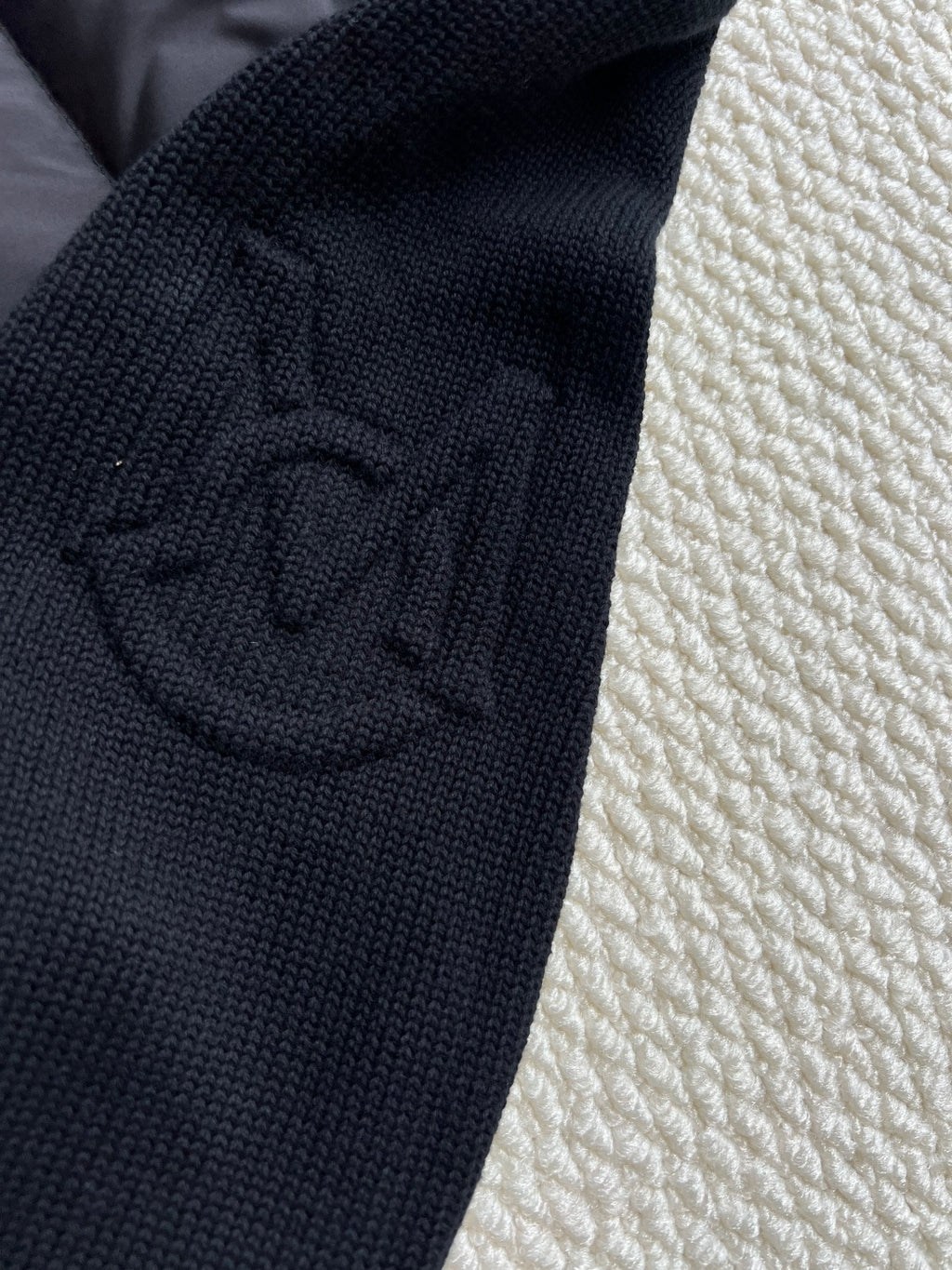Moncler knit logo patch on jacket sleeve cuff, dark navy