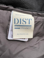 Down-certified fabric label reading DIST on Moncler puffer jacket lining
