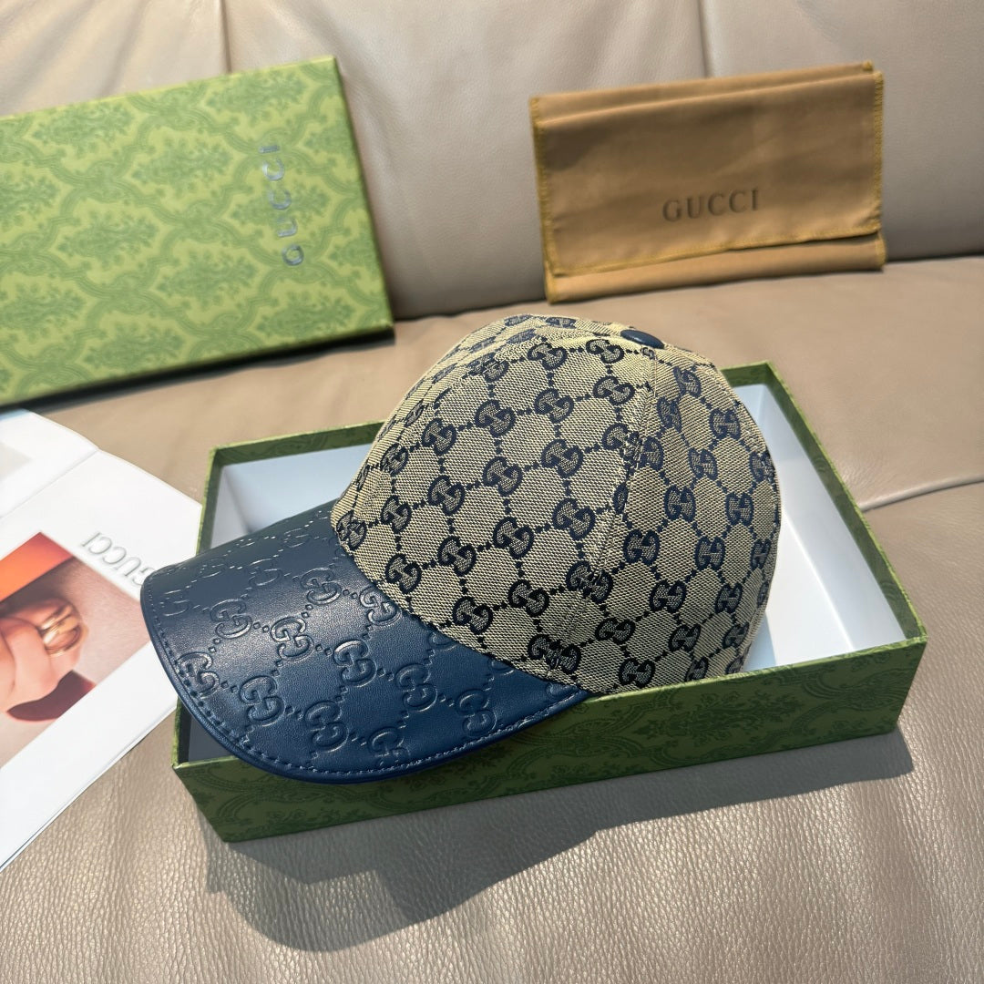 Gucci GG-print baseball cap with dark blue brim and top button, side view