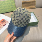 Gucci GG monogram baseball cap with dark blue brim and front button