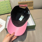 Gucci cap with pink brim shown from inside, black lining and back strap visible