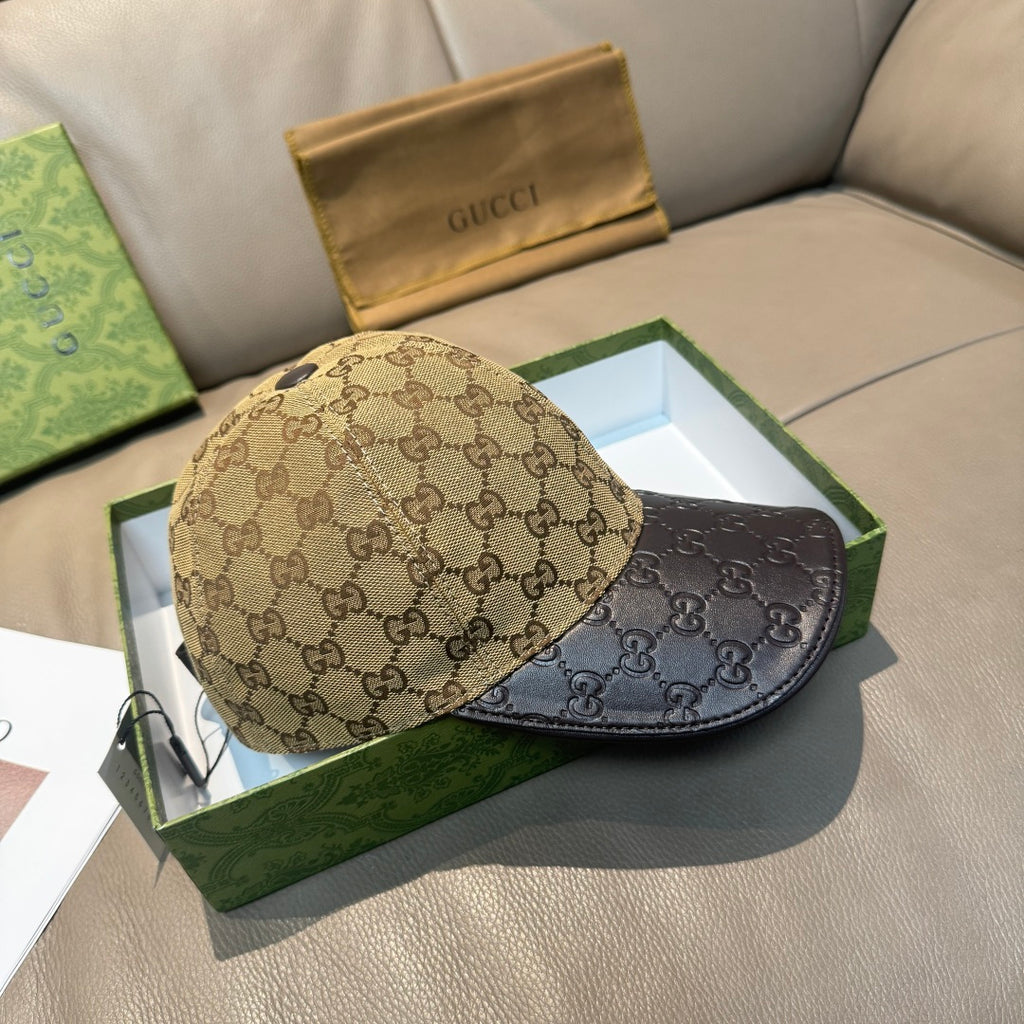 Gucci caps: beige GG cap and dark logo cap on box