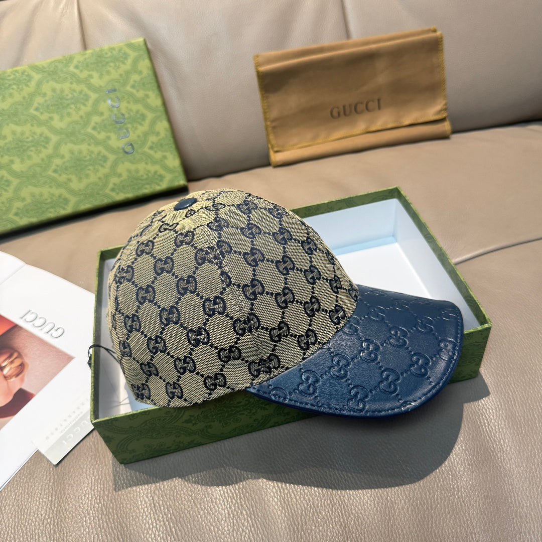 Gucci baseball cap with GG monogram crown and dark blue brim, front angle