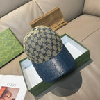 Gucci baseball cap with GG monogram crown and dark blue leather brim