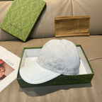 Gucci monogram baseball cap in light gray/white with curved brim