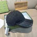 Dark navy GG monogram baseball cap with curved brim, front view