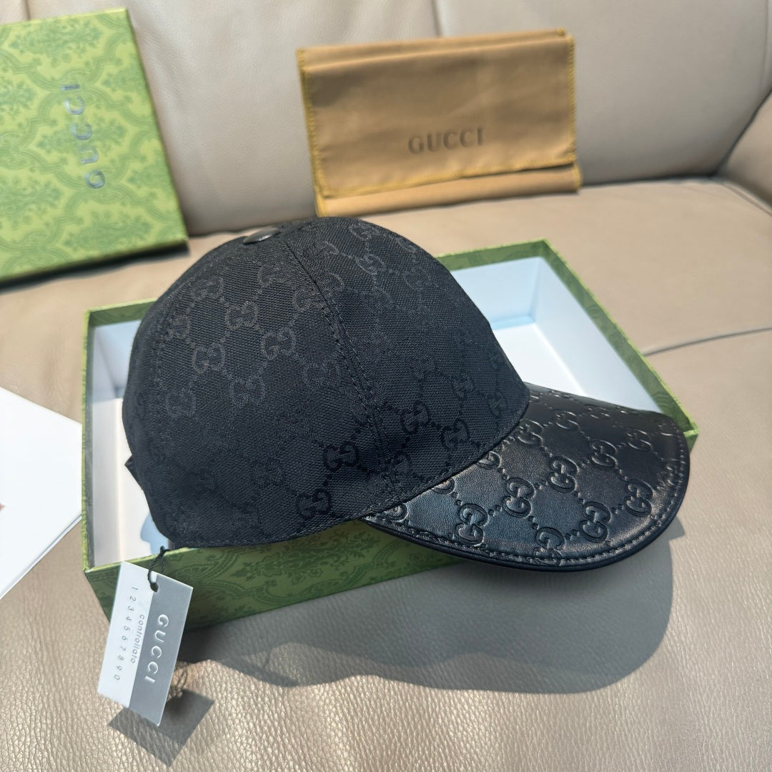Dark navy GG monogram baseball cap with curved brim, front view