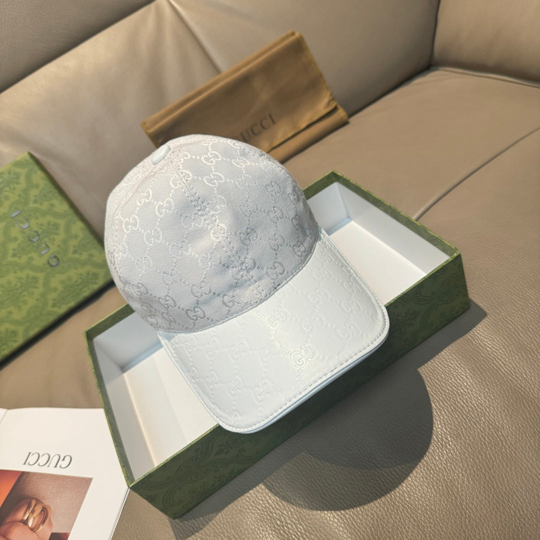 Gucci monogram baseball cap in light gray with white logo pattern and curved brim