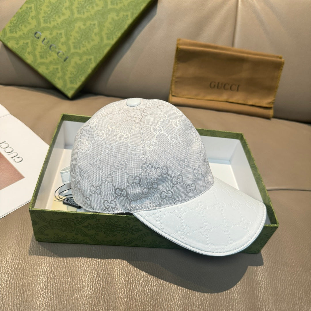 Gucci monogram baseball cap in light gray with white logo pattern and curved brim
