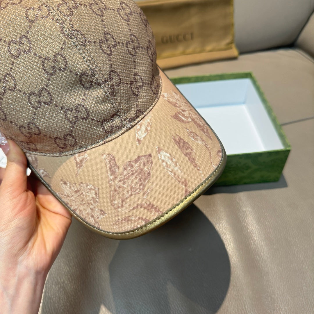Gucci baseball cap close-up: beige GG monogram crown and animal-print brim with trim