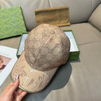 Gucci baseball cap with beige GG monogram crown and tan animal-print brim