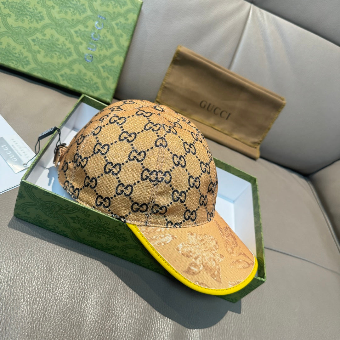 Tan GG monogram baseball cap with yellow-trim brim, front and side view