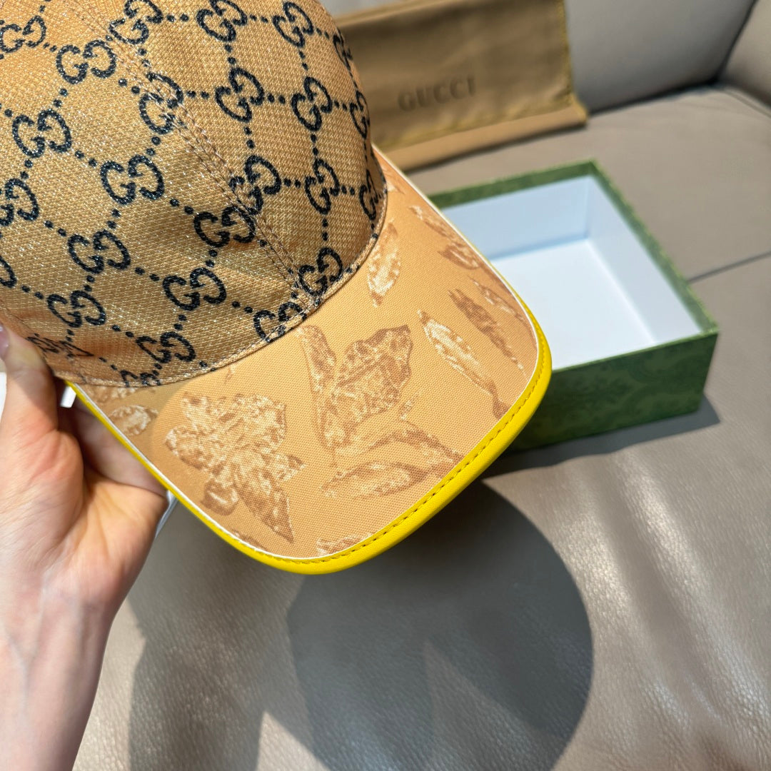 Tan GG monogram baseball cap with embossed-look brim and yellow trim detail