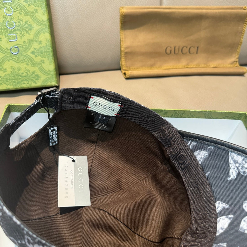 Black interior of cap with adjustable strap and label inside; GG monogram outer