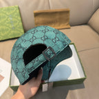Gucci teal monogram cap interior with adjustable strap and metal buckle
