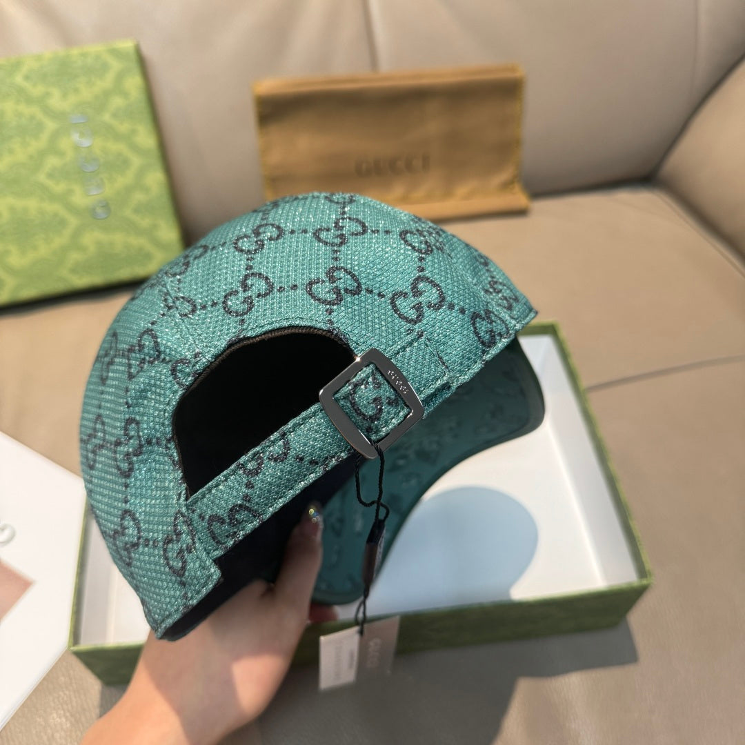 Gucci teal monogram cap interior with adjustable strap and metal buckle