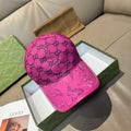 Gucci logo baseball cap in bright pink with GG monogram pattern and curved brim