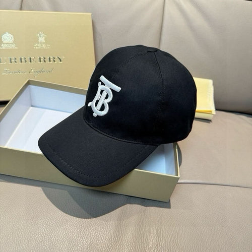 Black baseball cap with white TB logo, angled front view