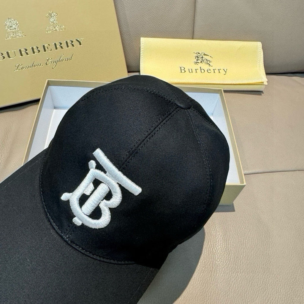 Black baseball cap with raised TB logo embroidery on crown