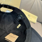 Black baseball cap lining with size tag and Burberry label inside