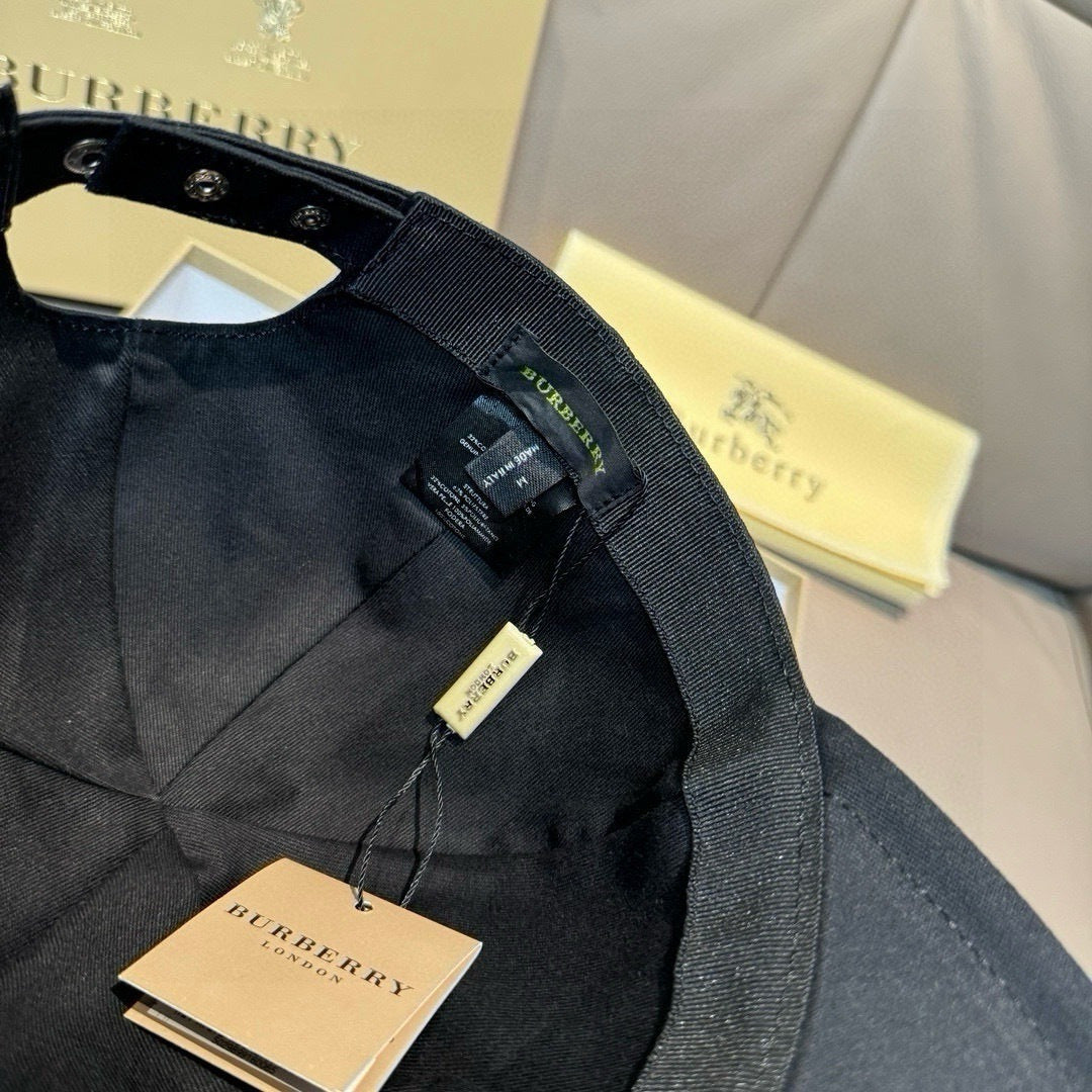 Black baseball cap lining with size tag and Burberry label inside