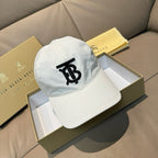 White baseball cap with black TB logo at the front panel