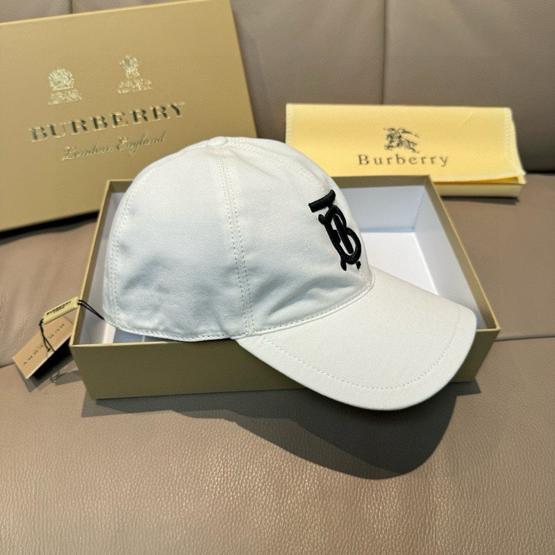 White baseball cap with black TB logo on curved front
