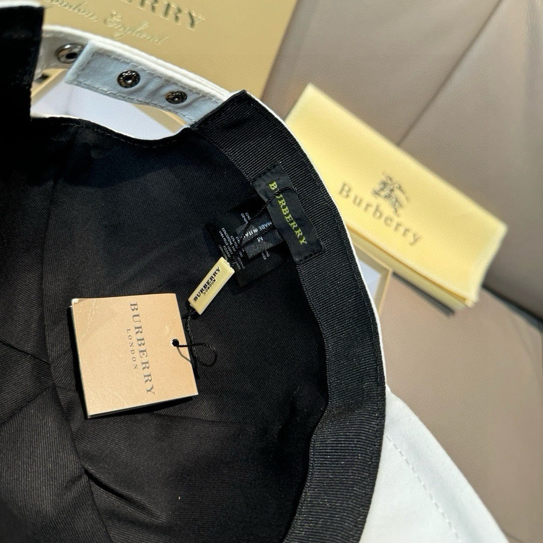 Black baseball cap interior with adjustable strap and small label tag