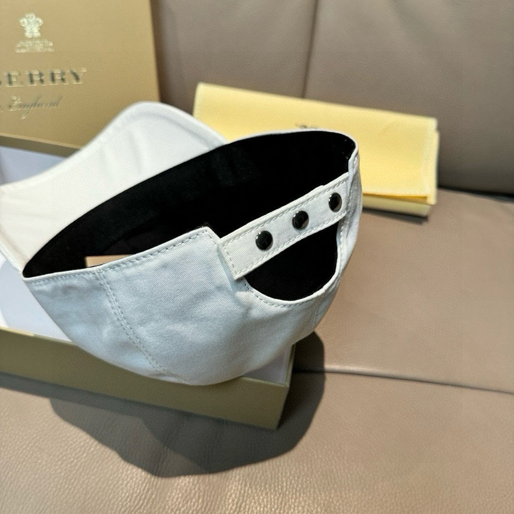 White baseball cap interior with black brim lining and metal grommets