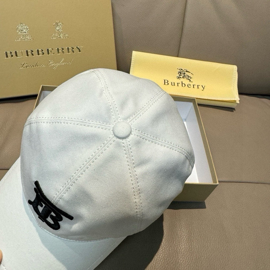 White baseball cap back with top button and black TB logo detail