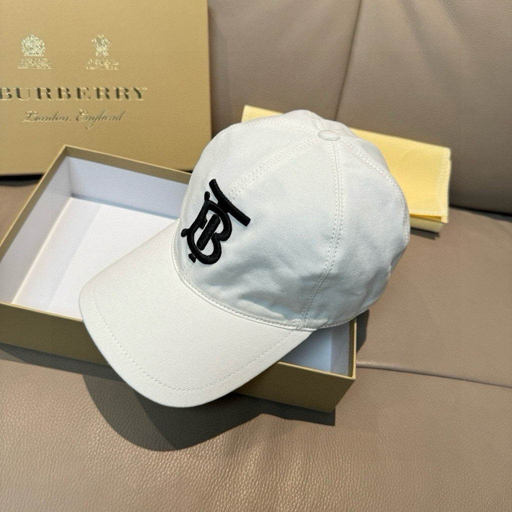 White baseball cap with black TB logo on the side panel