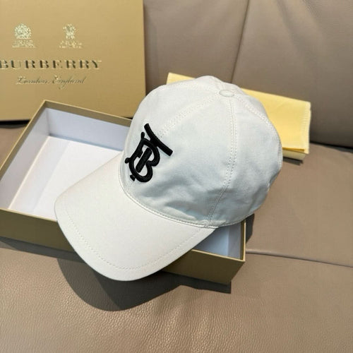 White baseball cap with black TB logo on the side panel