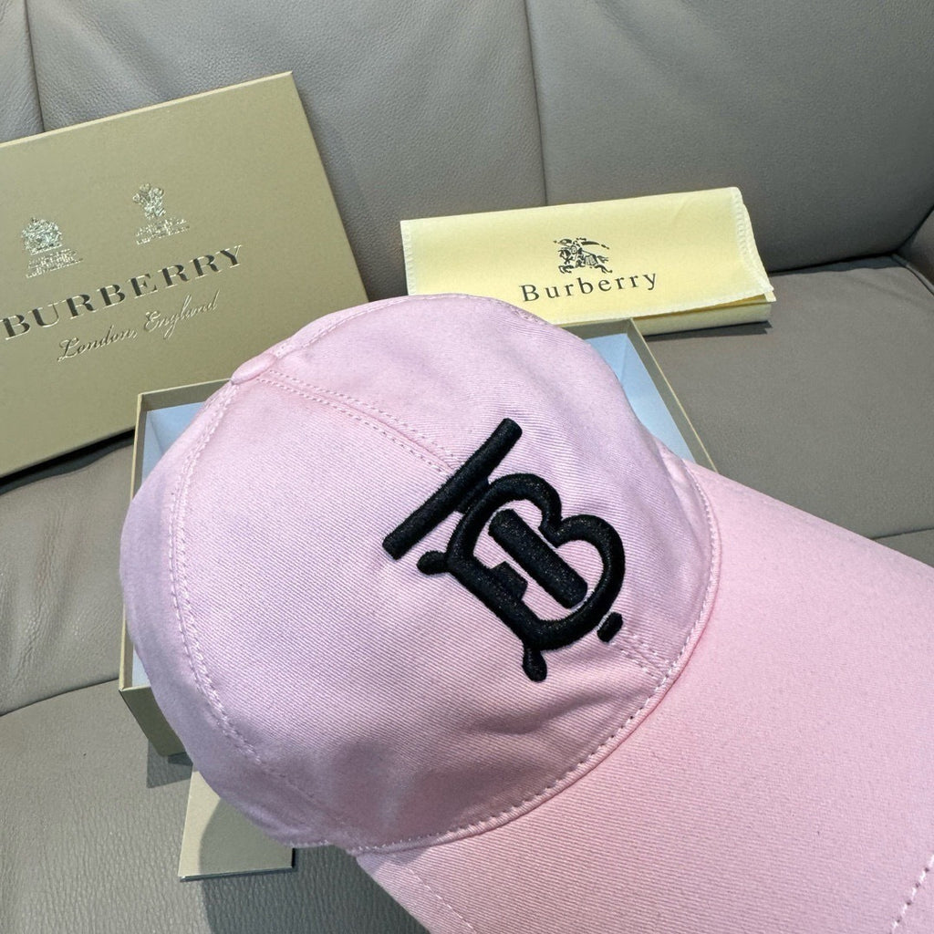 Pink baseball cap back view with black TB-style logo on the crown and curved brim